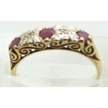 A 9ct gold ring set with rubies and diamonds, 1.8g, size K