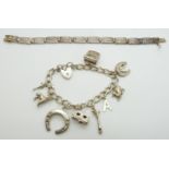 A silver Greek key bracelet and silver charm bracelet