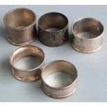 Five various hallmarked silver napkin rings, weight 91g