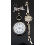 Continental silver open faced pocket watch with gold hands, black Roman numerals, floral decorated
