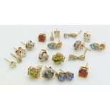 Nine pairs of 9ct gold earrings set with diamonds, topaz, peridot etc, 9g