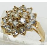 A 9ct gold ring set with a cluster of quartz, size J, 3g.