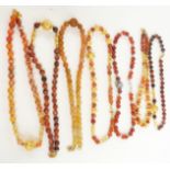 Seven agate and gilt beaded necklaces