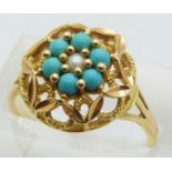 A 9ct gold ring set with a central pearl and turquoise, 3.5g, size P