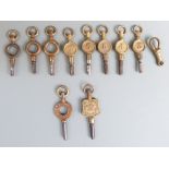 Eleven pocket watch keys including one Norville Gloucester and another G A Baker, Southgate,
