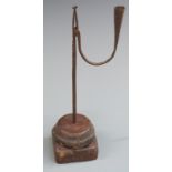 Georgian wrought iron and wooden rush light holder, height 35cm