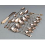 Hallmarked silver spoons to include a set of nine Georgian teaspoons and a set of silver sugar