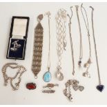 A collection of silver jewellery including Mizpah brooch, chains, pendants, silver brooch (Chester