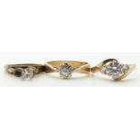 Two 9ct gold rings set with cubic zirconia and another ring, 6.9g