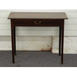 Georgian mahogany side table, the top inlaid with a shell flanked by two eight-point stars, the