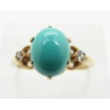 A 9ct gold ring set with faux turquoise and cubic zirconia, 2.9g, size P