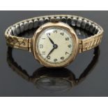 Buren 9ct gold ladies wristwatch with blued hands, black Arabic numerals, champagne dial and