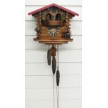 Three train German cuckoo clock with musical dancers feature