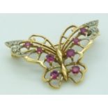 A 9ct gold butterfly brooch set with rubies and diamonds, 3.1 x 2.2cm