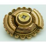 Victorian brooch set with an old cut diamond verso glass compartment, 3cm