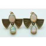 A pair of 9ct gold earrings each set with two oval opals, 4.8g