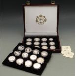 A collector's case containing 24 crown sized silver coins in honour of Her Majesty Queen Elizabeth