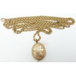 Victorian 9ct gold guard chain, 70cm long, 37.9g  and an oval mourning locket with engraved