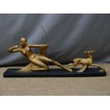 An Art Deco statue of Diana the Huntress, signed S. Melani, length 78cm