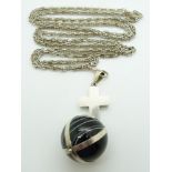 A silver cross pendant set with a large banded agate bead, on a large silver guard chain