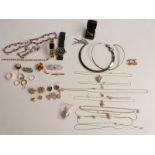 A collection of costume jewellery and some silver to include chains, necklace, rings, earrings etc