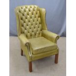Chesterfield wing back leather armchair