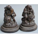 Pair of bronze figural groups of a young lady and her beau, both approximately 22cm tall