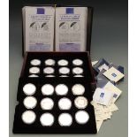 A collector's case containing 24 crown sized silver coins in honour of HM Queen Elizabeth the