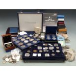 A large collection of miscellaneous cased coins, sundry coins, crowns etc, some silver content