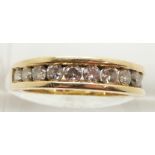 An 18ct gold half eternity ring set with twelve round brilliant cut diamonds, approximately 1ct