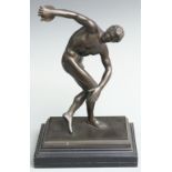 Bronze or similar Greek Olympian discus thrower on ebonised base, 38cm tall