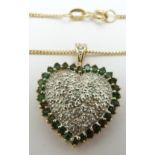 A 9ct gold heart shaped pendant set with diamonds and emeralds on a 9ct gold chain, 5.5g