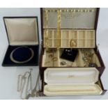 A collection of costume jewellery including 9ct gold earrings, silver locket, silver ingot,