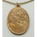 A 9ct gold locket with engraved decoration and chain, 3.5 x 2.5cm, 13.4g