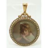 A 9ct gold locket set with a portrait miniature surrounded by seed pearls, 3cm diameter