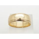 A large 9ct gold ring/ wedding band, size 1, 6.2g.