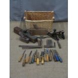 A collection of wooden woodworking tools to include set squares, spokeshave, chisels and a spirit