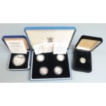 A cased set of four Royal Mint UK silver proof £1 coins 1989-1992, together with an Isle of Man