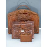 Three ladies handbags comprising alligator skin large bag, snakeskin briefcase and miniature