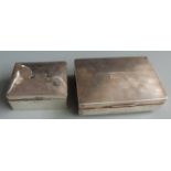Two hallmarked silver cigarette boxes, width of larger 16.5cm