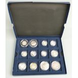 Westminster Collection box containing twelve silver UK coins including £1, fifty pence, £2, crown