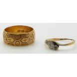 Victorian 18ct gold ring with embossed decoration, Birmingham 1891 and an 18ct gold ring set with