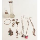 A collection of silver jewellery including pendants, horseshoe pendant, vintage paste necklace,