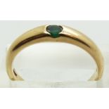 A 9ct gold ring set with an emerald, 2.9g, size R