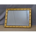 19thC style bevelled edge gilt mirror with applied spheres, 121 x 97cm overall