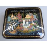 Russian lacquer box depicting a harbour and landscape, signed, 12cm x 10cm x 3.5cm