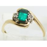 A 9ct gold ring set with a faux emerald and diamonds, 2.1g, size Q