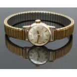 Rotary 9ct gold ladies wristwatch with gold hands and hour markers, silver dial and 21 jewel calibre