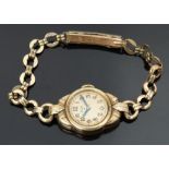 Elgin gold plated ladies wristwatch with blued hands, Arabic numerals, champagne dial and signed