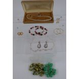 A collection of costume jewellery including a Ciro necklace with receipt, earrings, silver